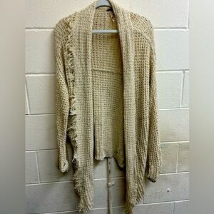 Woman’s Free People cream cardigan size large